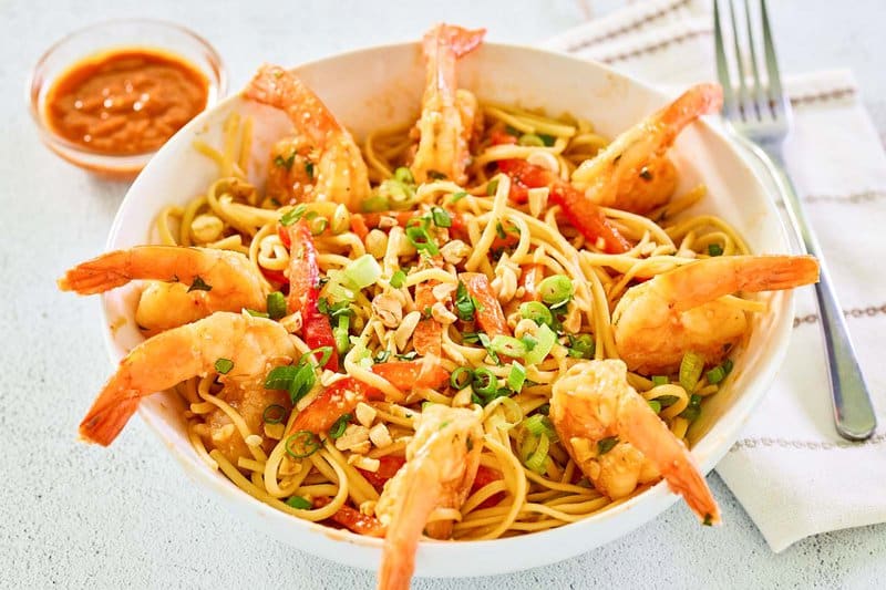 A bowl of copycat Planet Hollywood Thai shrimp pasta.