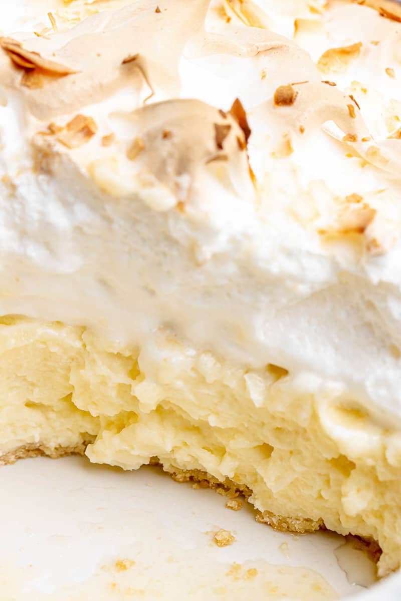 Closeup of copycat Luby's coconut meringue pie in a pie plate.