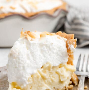 Copycat Luby's coconut meringue pie slice on a plate.