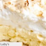 Closeup of homemade Luby's coconut meringue pie in a pie plate.