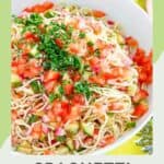 Copycat Luby's spaghetti salad in a large white bowl.