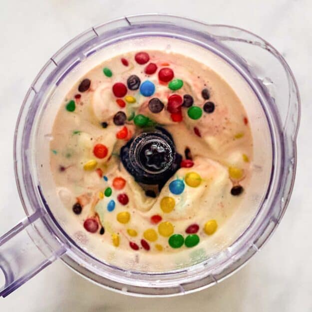 Copycat McDonald's M&M McFlurry mixture in a blender.