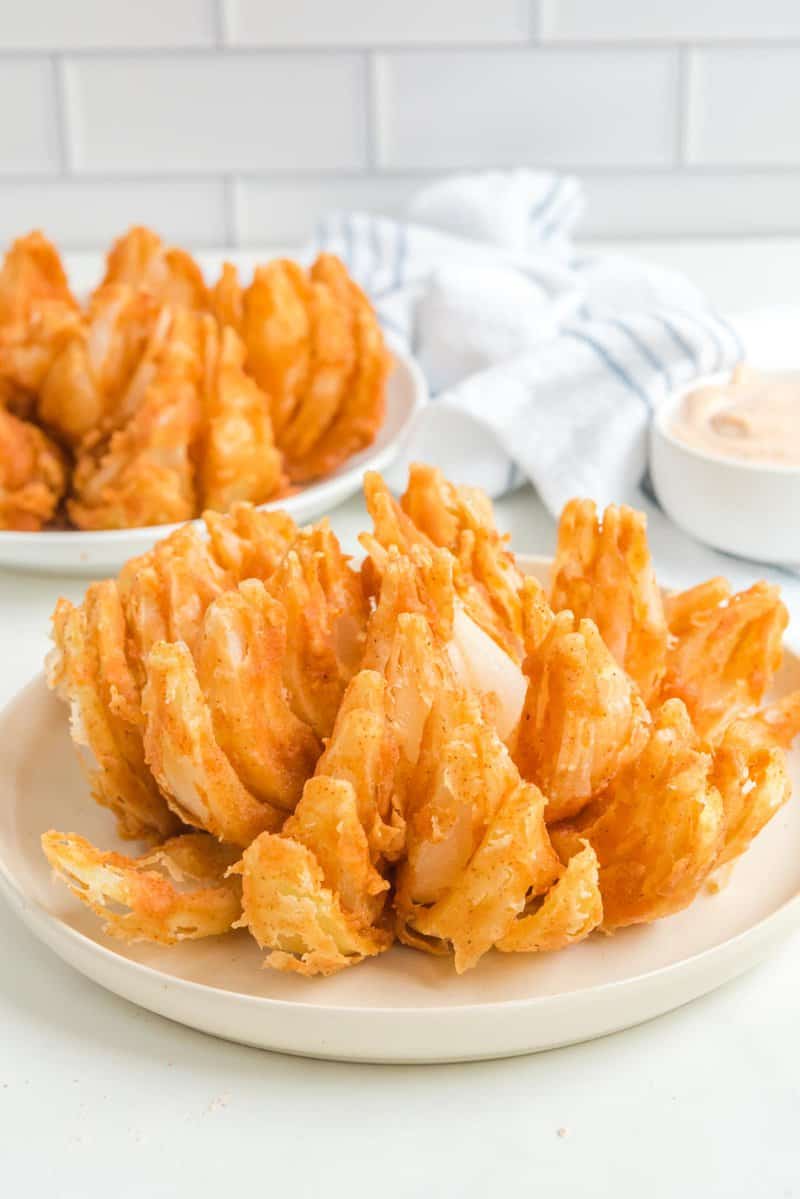 Copycat Outback Steakhouse bloomin onion and dipping sauce.