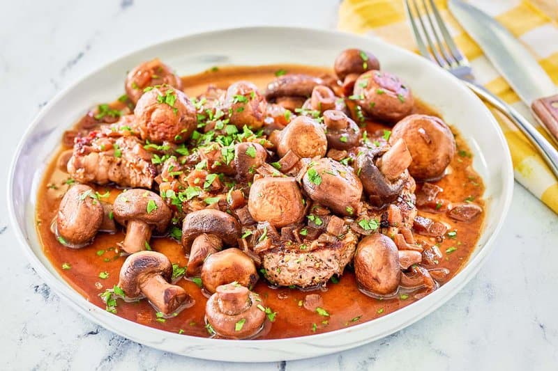 Copycat Outback sauteed mushrooms on a plate.