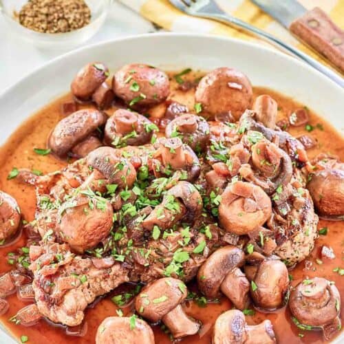 Copycat Outback Steakhouse sauteed mushrooms on a plate.