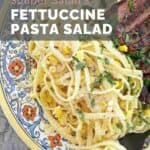 Copycat Souper Salad fettuccine pasta salad on a colorful plate.
