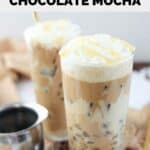 Homemade Starbucks iced white chocolate mocha drinks topped with whipped cream.