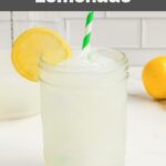 Homemade Starbucks Lemonade in a mason jar garnished with a slice of lemon.