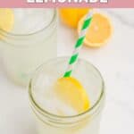 Homemade Starbucks lemonade with a lemon slice and colorful straw.