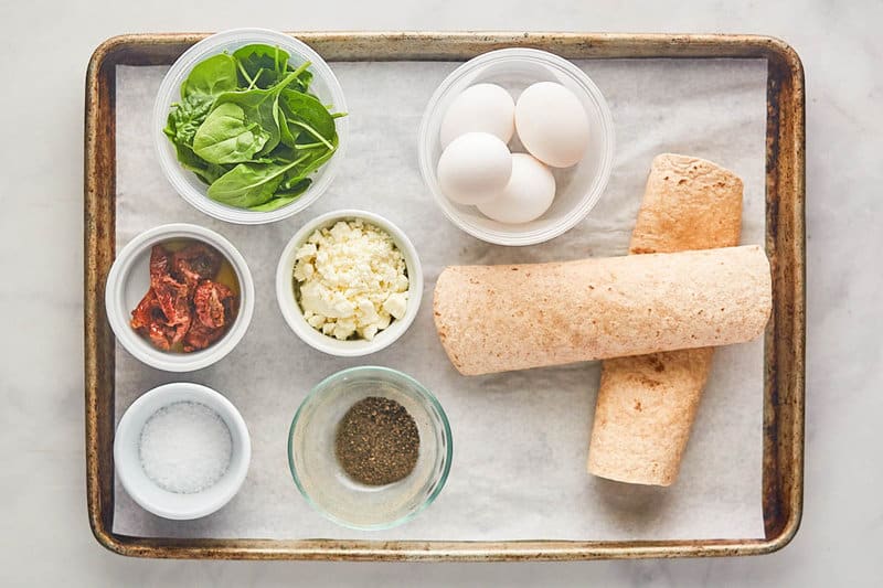 Copycat Starbucks spinach feta wrapper  ingredients connected  a tray.