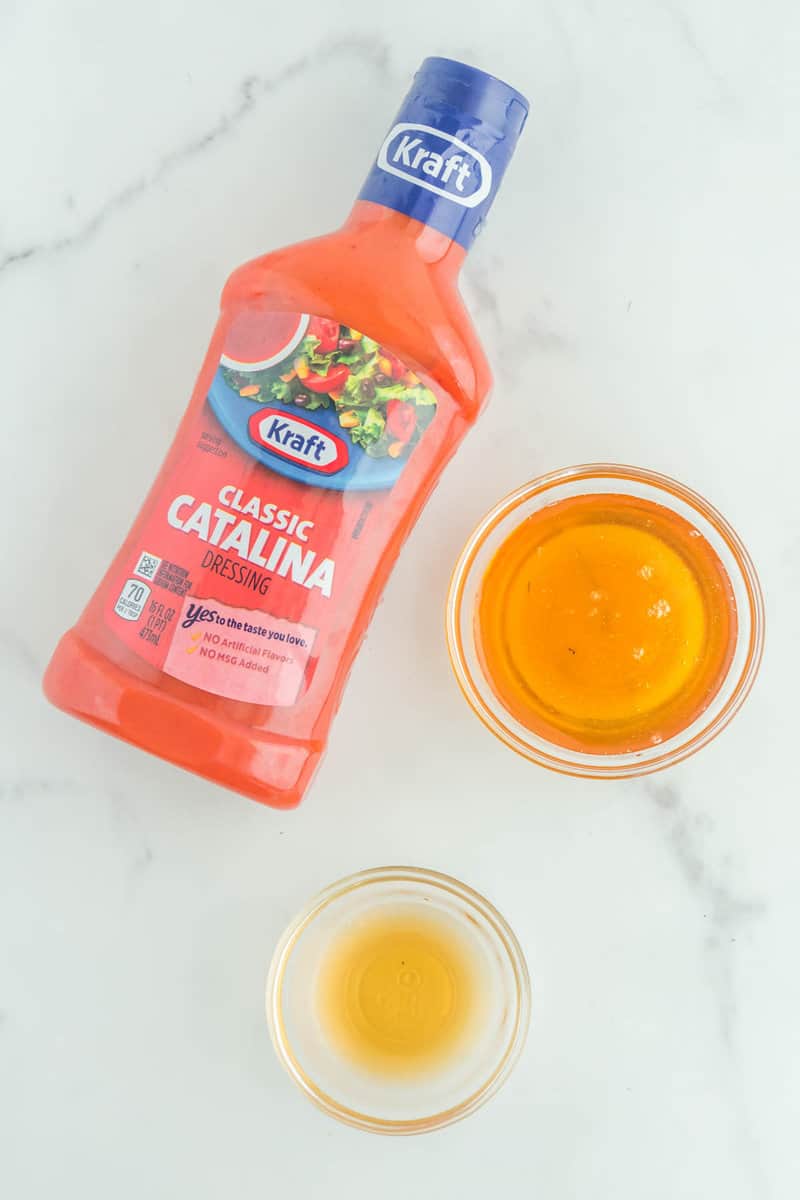 Copycat Chick Fil A Polynesian sauce ingredients on a marble surface.