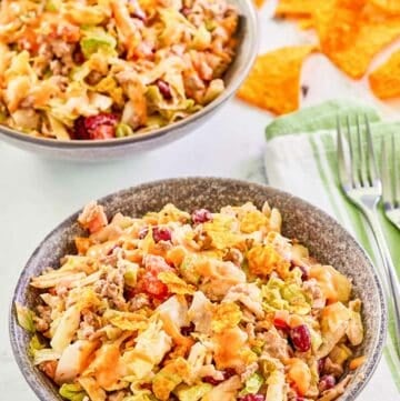 Dorito taco salad in two bowls.