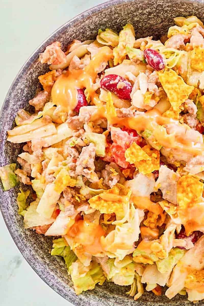 Closeup of Dorito taco salad in a bowl.