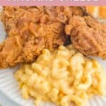 Homemade KFC mac and cheese and fried chicken on a plate.