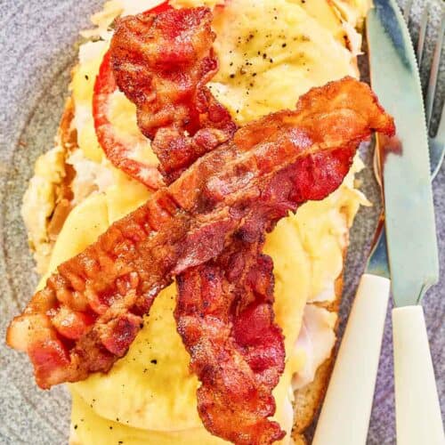 Overhead view of a turkey devonshire sandwich on a plate.