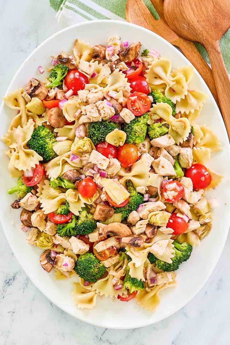 Overhead view of chicken pasta salad with vegetables.