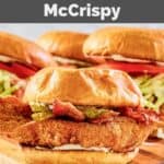 Homemade McDonald's bacon ranch McCrispy sandwiches on a wood board.
