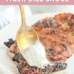 Copycat Outback Steakhouse tiger dill sauce on a spoon over a steak.