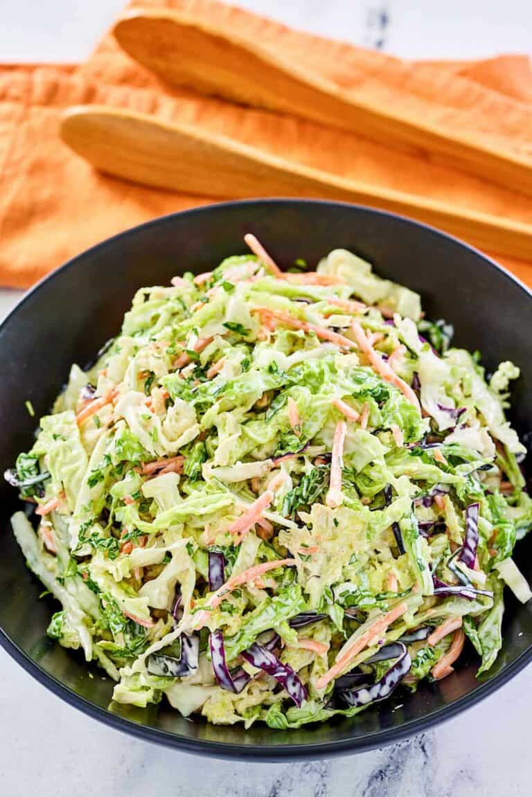 A bowl of sweet and sour coleslaw.