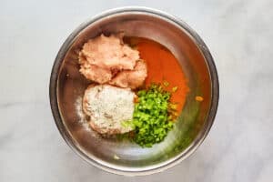 Buffalo chicken jalapeno popper stuffing ingredients in a bowl.