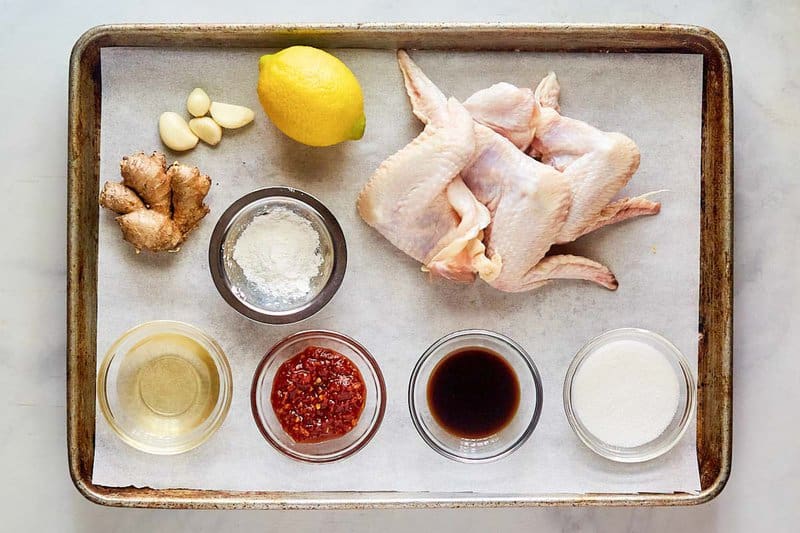 Copycat Buffalo Wild Wings Asian Zing wings ingredients connected  a tray.