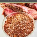 Homemade coffee rub spice mix in a small bowl and steak behind it.