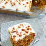 A slice of homemade Cracker Barrel carrot cake on a square plate.