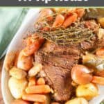 Instant pot tri tip roast, carrots, and potatoes on a platter.