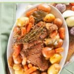 Instant Pot tri tip roast, potatoes, and carrots on a platter.