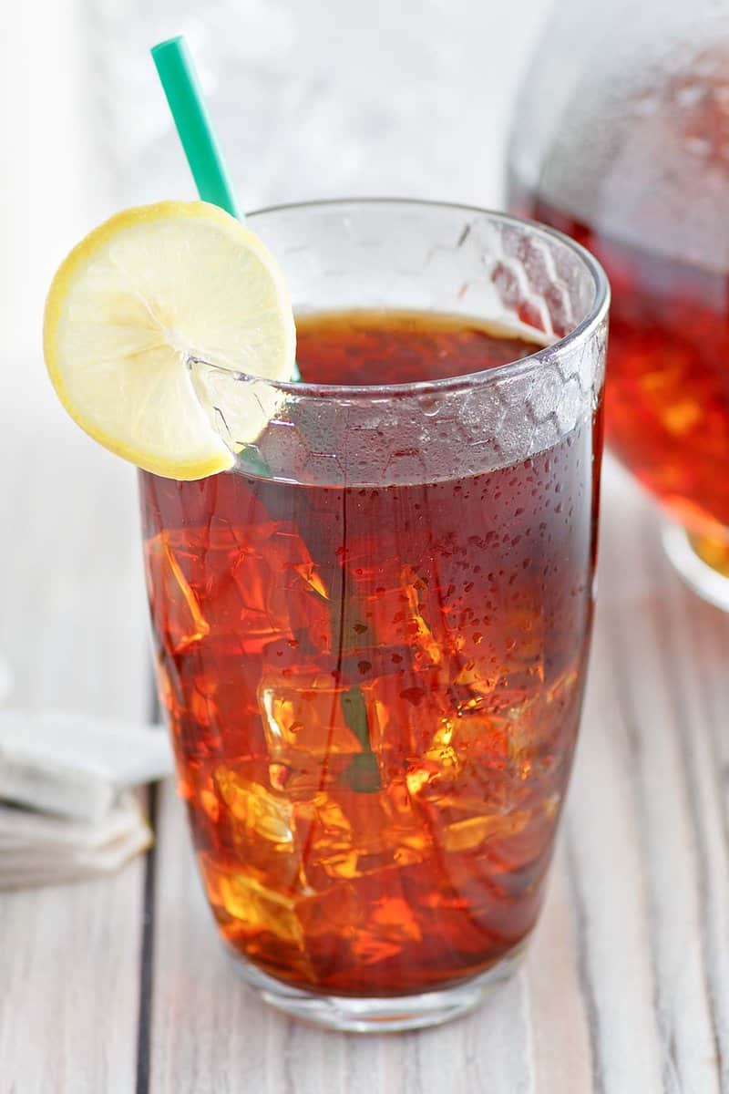 Copycat McDonald's sweet tea in a glass with ice.