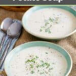 Homemade old-fashioned potato soup in green bowls.