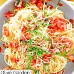Overhead view of homemade Olive Garden capellini pomodoro in a pasta bowl.