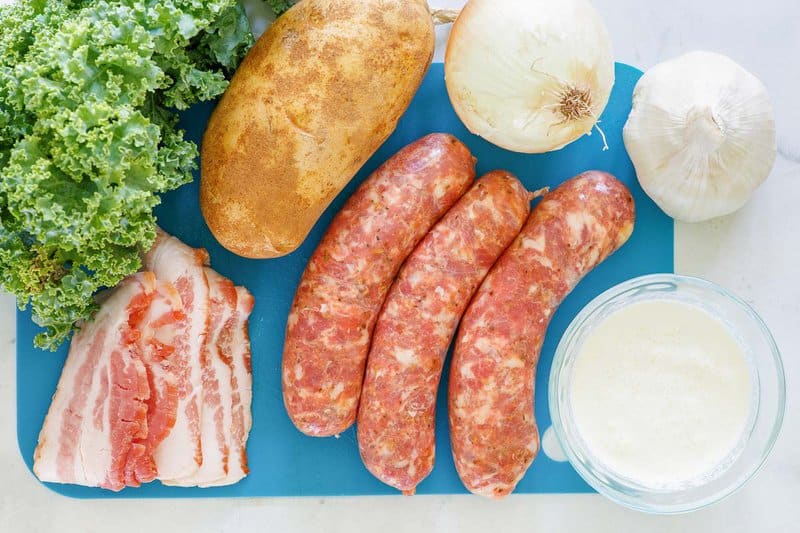 Copycat Olive Garden Zuppa Toscana soup ingredients on a tray.