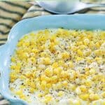 Copycat Rudy's creamed corn in a blue serving dish.