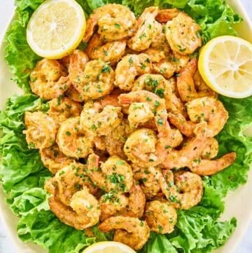 Overhead view of shrimp remoulade on a platter.