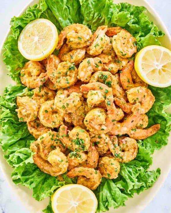 Overhead view of shrimp remoulade on a platter.