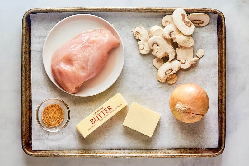 Copycat Texas Roadhouse smothered chicken ingredients on a tray.