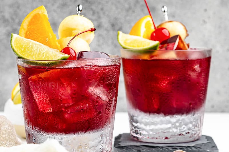 Two copycat Applebee's red apple sangria drinks.