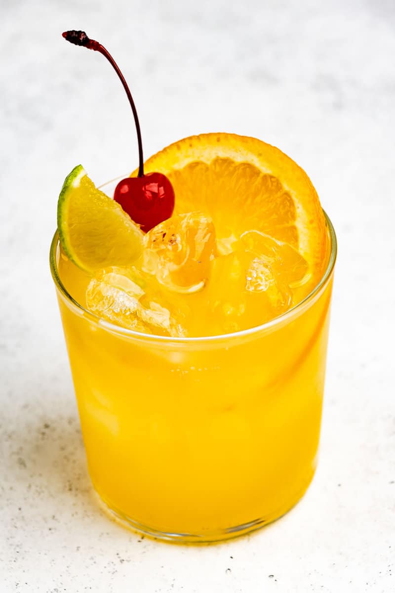 Copycat Applebee's white peach sangria with fruit garnish.