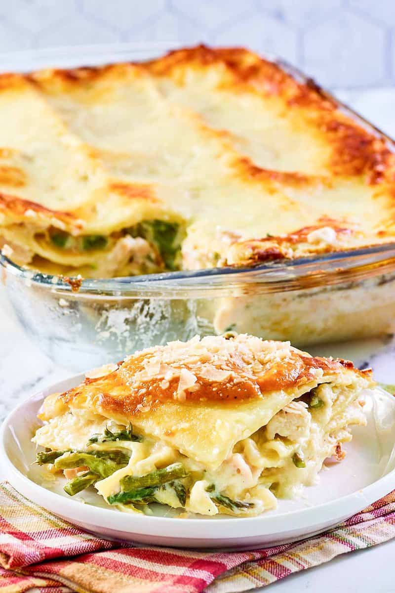 Chicken lasagna with asparagus and white wine sauce.