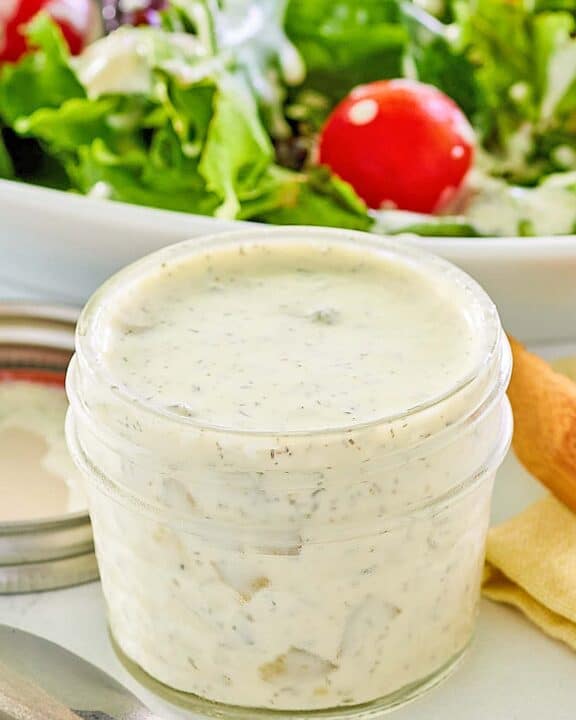 A jar of homemade dill pickle ranch dressing.