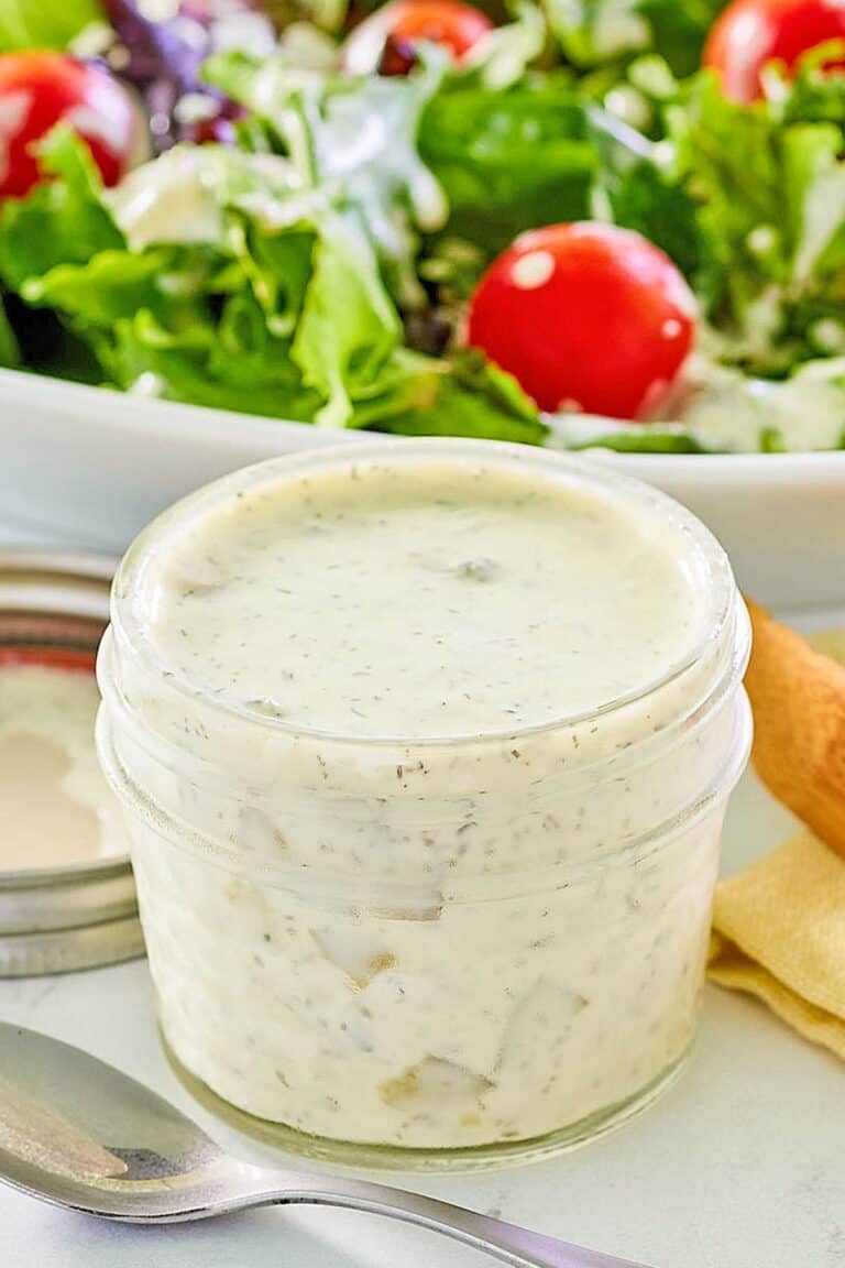A jar of homemade dill pickle ranch dressing.