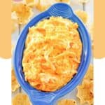 Overhead view of Frank's Buffalo chicken dip in a blue serving dish.