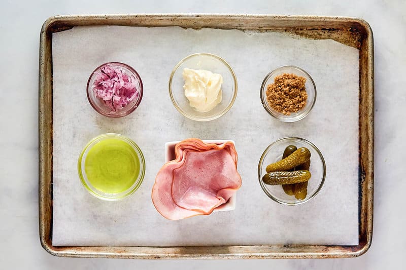 Ham salad ingredients on a tray.