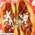 Homemade James Coney Island chili and onions on hot dogs.