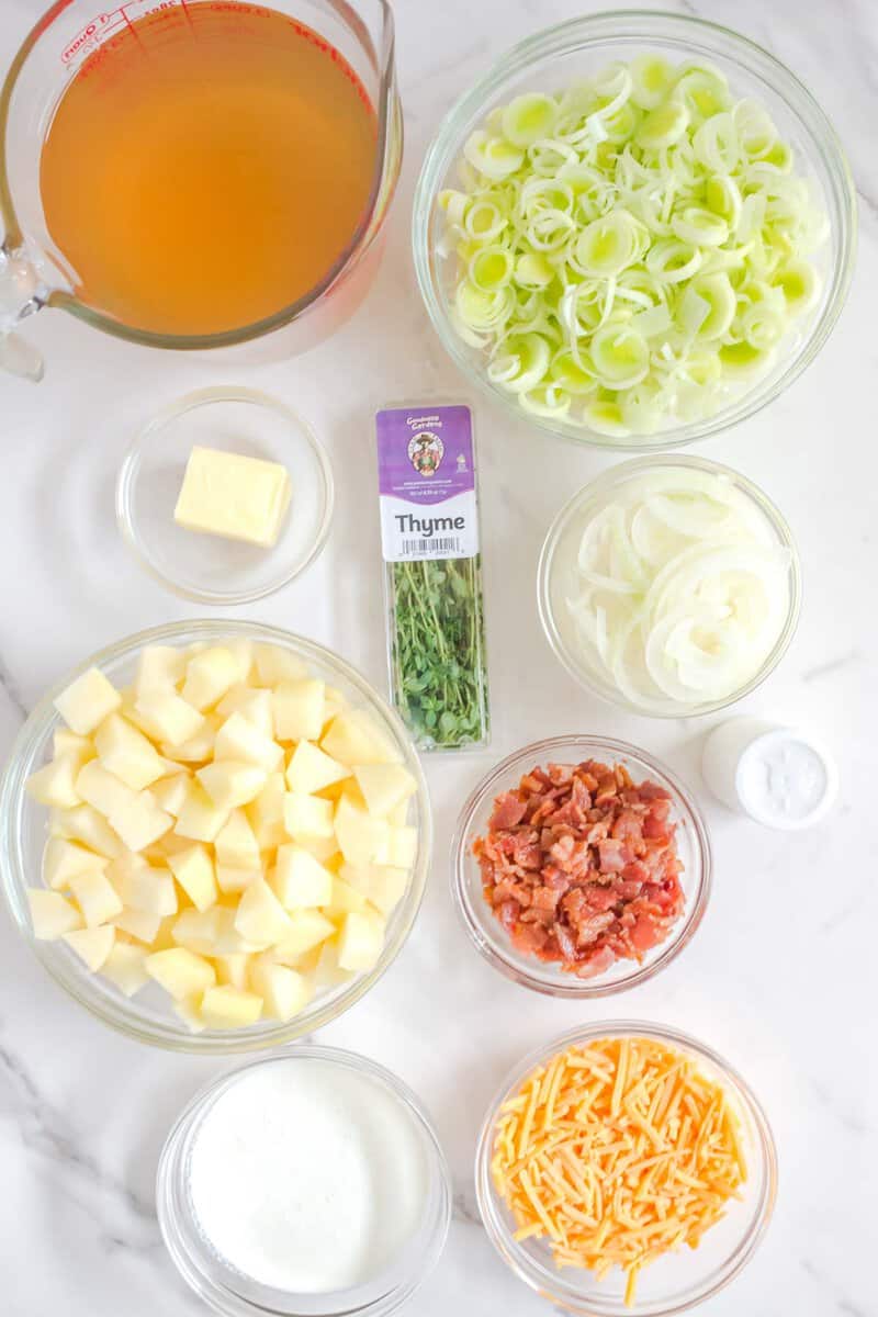 Copycat La Madeline country potato soup ingredients on a marble surface.