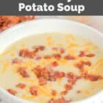 Homemade La Madeleine country potato soup garnished with bacon and cheese.