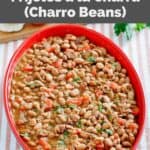 Copycat Pappasito's charro beans in a serving dish.