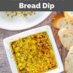 Copycat Carrabba's Italian olive oil bread dipping sauce in a small square bowl.