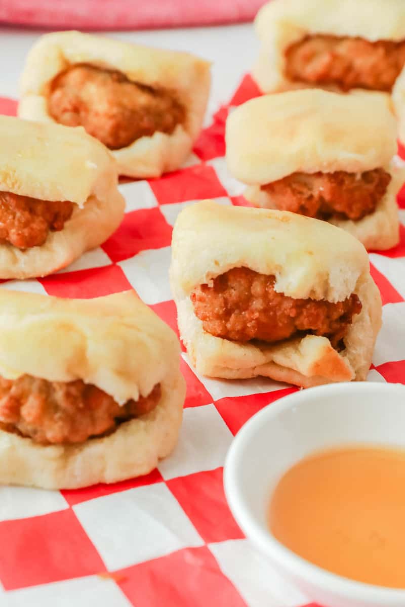 Homemade Chick Fil A chicken minis and a bowl of sauce.